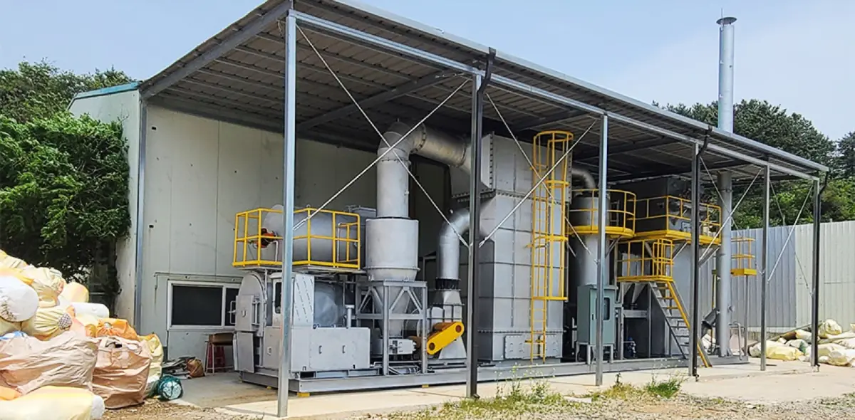 Full-scale GREENASH plant under a steel shelter